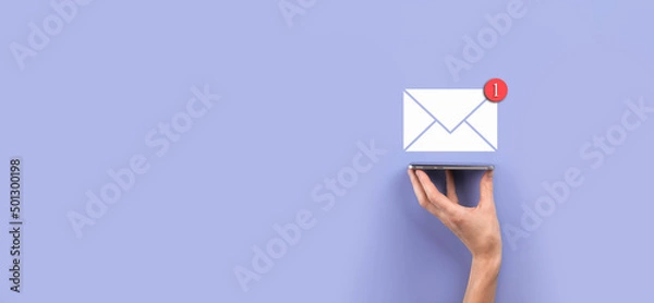Fototapeta Businessman hand holding letter icon,email icons.Contact us by newsletter email and protect your personal information from spam mail.Customer service call center contact us.Email marketing newsletter.