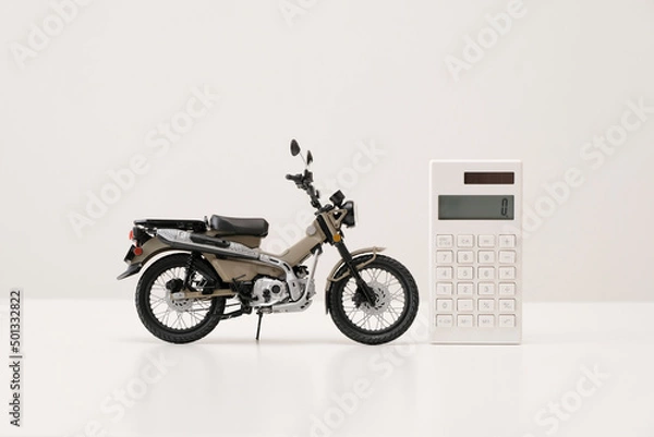 Obraz オートバイと電卓
