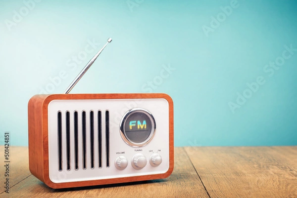 Fototapeta Retro old FM radio front mint blue background. Vintage style filtered photo