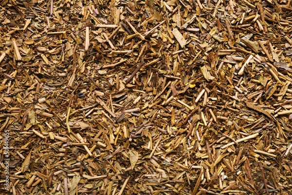 Fototapeta Heap of hojicha green tea as background, closeup