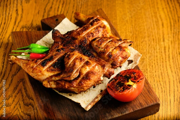 Fototapeta roasted quail with vegetables