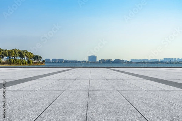 Fototapeta Panoramic skyline and buildings with empty square floor.