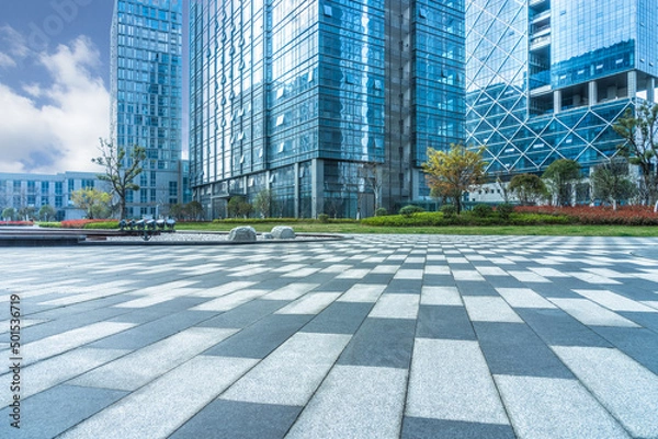 Fototapeta modern buildings and empty pavement in china.