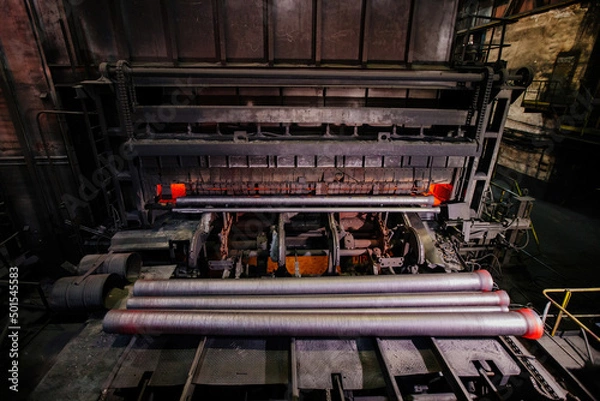 Fototapeta Freshly cast iron pipe at the foundry
