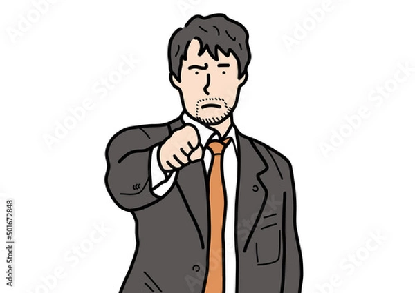 Fototapeta 拳を握りしめている、スーツ姿の男性。