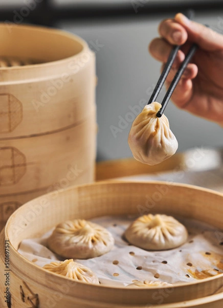 Fototapeta Chinese steamed Buns or Xiaolongbao with crab meat and roe.
