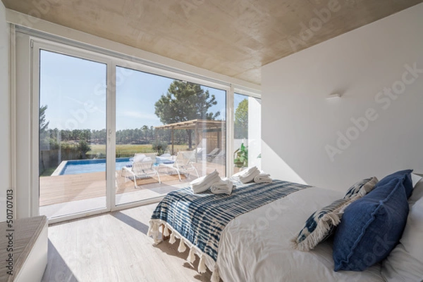 Obraz Modern villa with pool and deck with interior