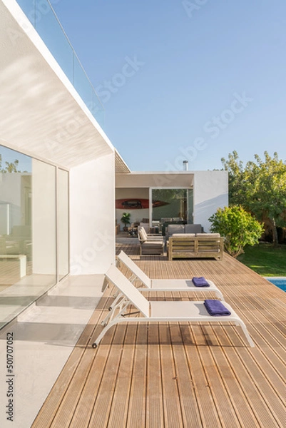 Obraz Modern villa with pool and deck with interior
