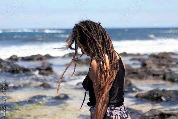 Obraz woman on the beach in winter