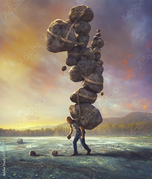 Obraz Man carrying heavy rocks