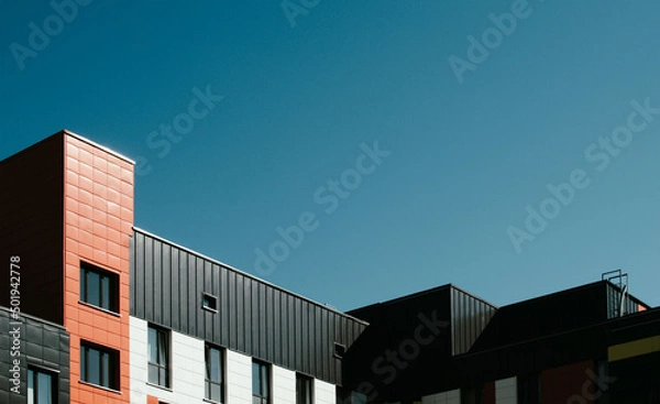 Fototapeta Fragment of a new multi-storey building