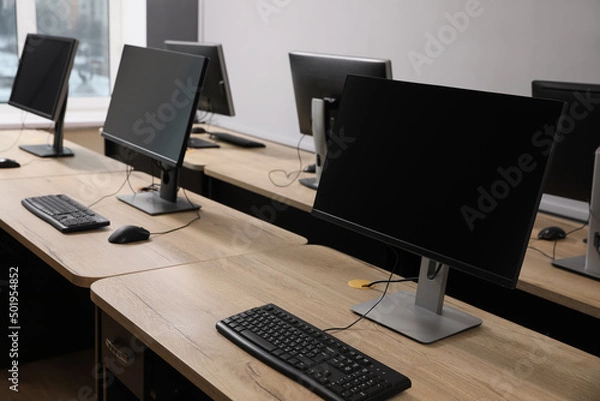 Obraz Many modern computers in open space office