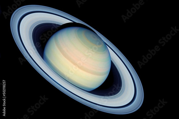 Fototapeta Planet Saturn on a dark background. Elements of this image furnished by NASA