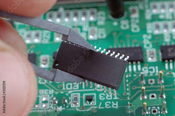 Obraz technician holding a silicon  chip