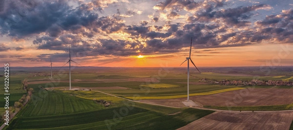 Obraz wind turbine at sunset