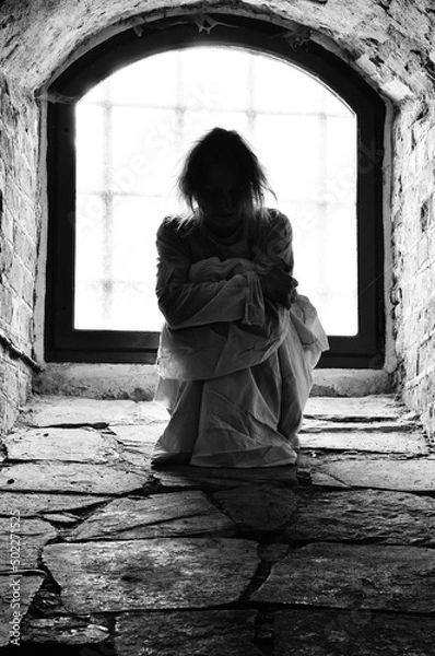 Obraz Woman trapped in cellar