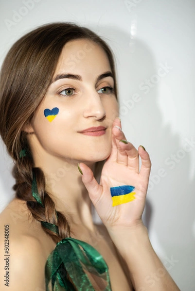 Obraz A patriotic girl with national symbols of Ukraine, no war