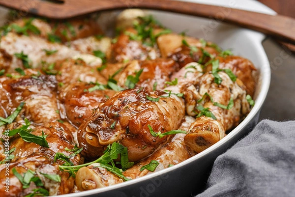 Fototapeta Uncooked homemade chicken with balsamic vinegar sauce in a baking dish. Shallow depth of field