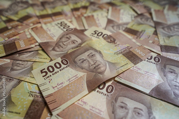 Obraz Money background. Cash money with the amount of five thousand rupiah "Rp5.000". The official currency of Indonesia from Bank Indonesia. 