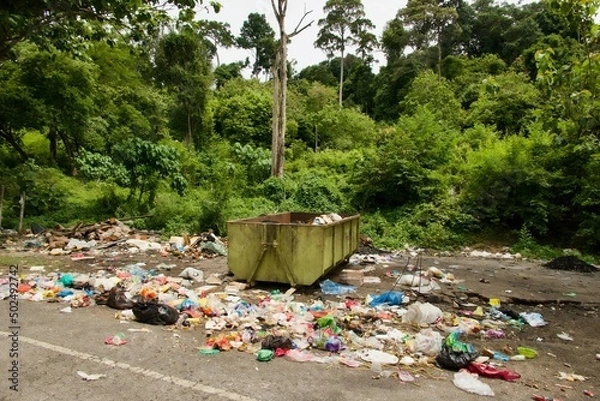 Fototapeta plastic garbage at the forest