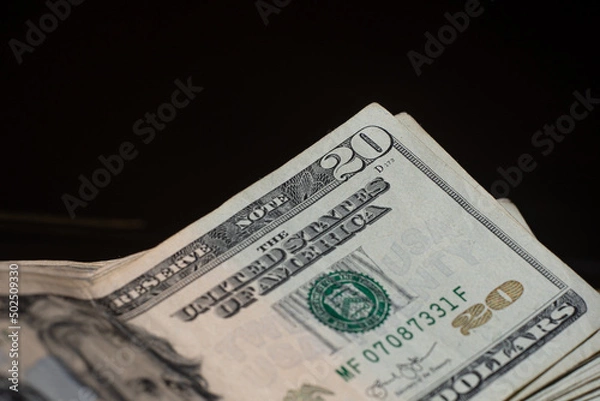 Obraz stack of twenty dollars banknotes, close up, front side