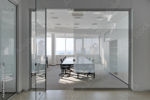 Obraz modern bright office with glass partitions, interior of modern office