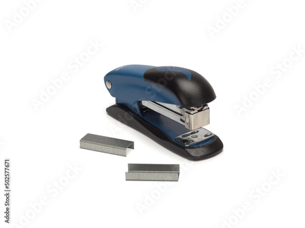 Obraz Photo of stapler on white background and staples nearby