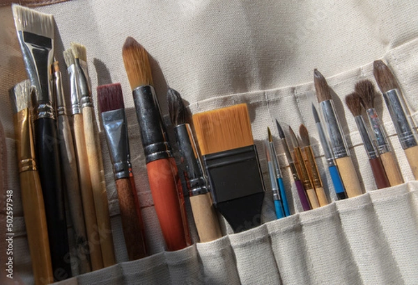 Fototapeta A set of brushes in a special case