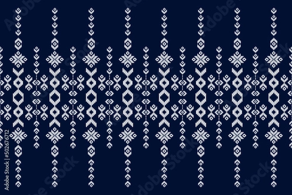 Obraz Fabric ikat pattern art. Geometric ethnic oriental seamless pattern traditional. Design for background, wallpaper, vector illustration, fabric, clothing, carpet, textile, batik, embroidery.