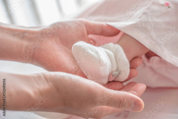 Fototapeta 赤ちゃんの足