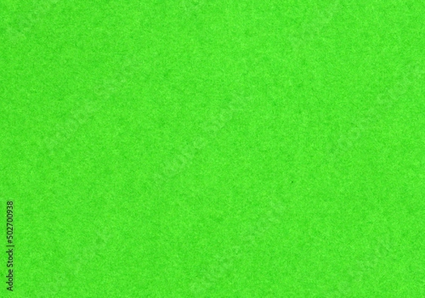 Fototapeta High detail scan of a paper texture background with fine fiber grain bright, neon green uncoated bond paper for wallpaper and design mockup with copy space for text