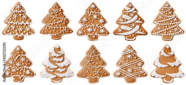 Fototapeta A set of gingerbread cookies in the form of Christmas trees. Various decorations made of sugar glaze. Isolated on white background.
