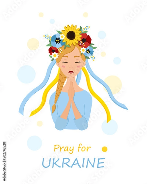 Obraz Beautiful ukrainian woman in a wreath with flowers prays for Ukraine. Stop war.