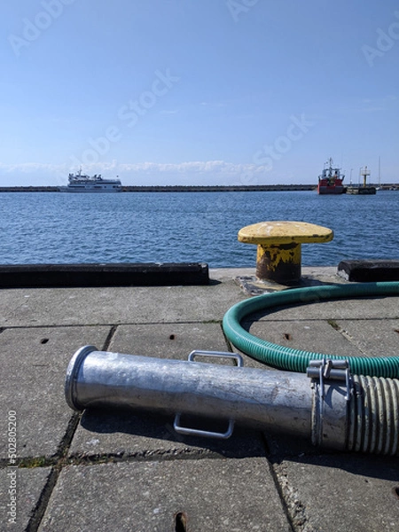 Obraz Refueling station for ships and boats on the port