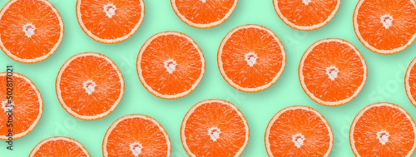 Fototapeta Orange on bright colored background