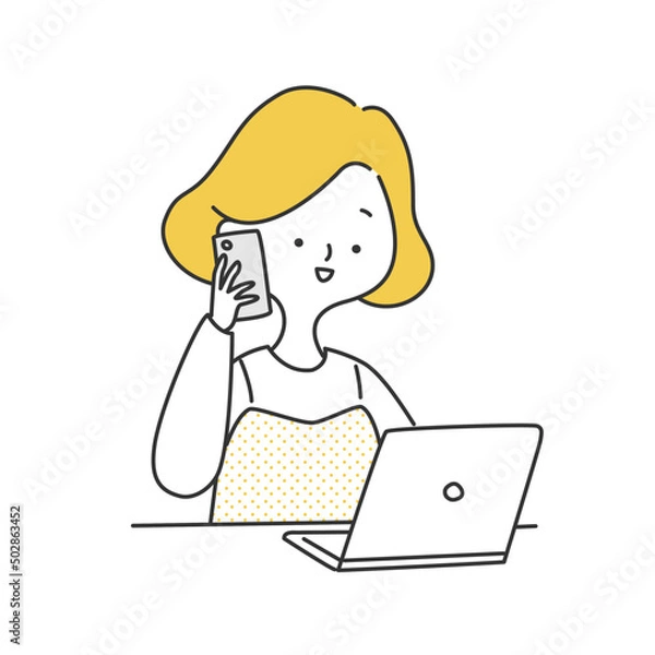 Fototapeta パソコンを見ながらスマホで問い合わせをする女性