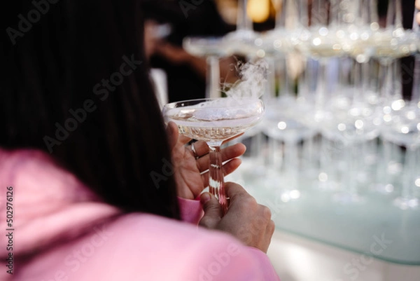 Fototapeta pyramid of champain set of empty wineglasses in restaurant bar
