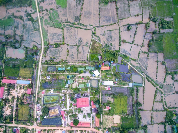 Fototapeta Flooding in rural cambodia