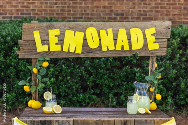 Fototapeta An empty lemonade stand ready for children to start selling lemonade on a hot summer day as their first business endeavor