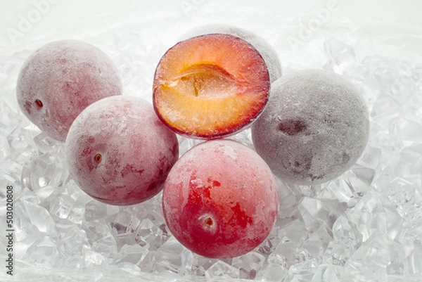 Obraz Fresh plum berries on quick freeze ice