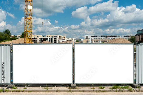 Obraz Blank white banner for advertisement mounted on the hoardin of construction site