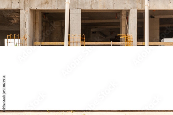 Obraz Blank white banner for advertisement mounted on the hoardin of construction site