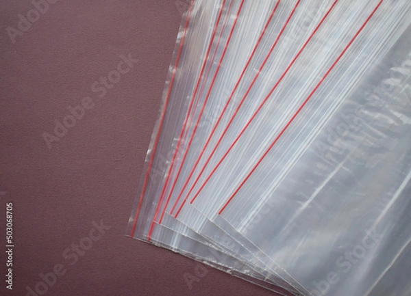 Obraz A set of plastic zip bags. Transparent plastic bags on a dark background.