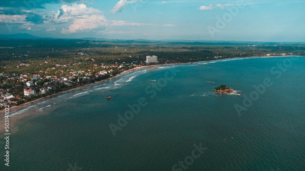 Obraz Tropical coast and ocean, drone shot, beautiful beach and water, tourist paradise.