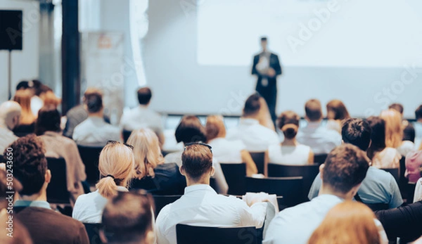 Fototapeta Business speaker giving a talk at business conference event.