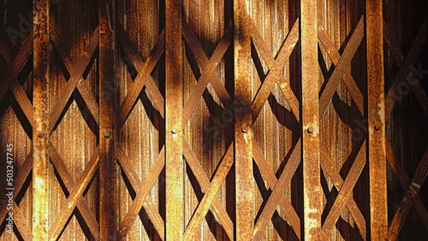 Obraz Rust Steel Stretch Door with light and shadow, Old Rust Steel Door Stretch Texture.