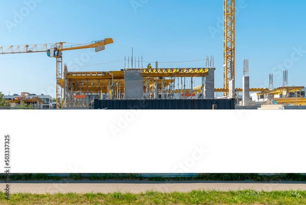 Obraz Advertising banner mock-up on the construction site fence
