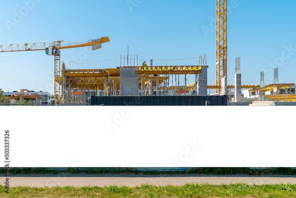 Obraz Advertising banner mock-up on the construction site fence