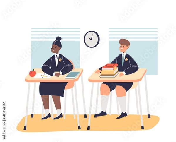Obraz Schoolchildren in uniform sitting at school desk in classroom at lesson. School pupils in class