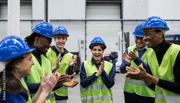 Obraz Team of multiracial engineers working in robotic factory - Tech industrial concept